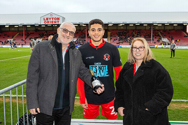 Ruel Sotirou being presented Goal of The Month Award for October by sponsor